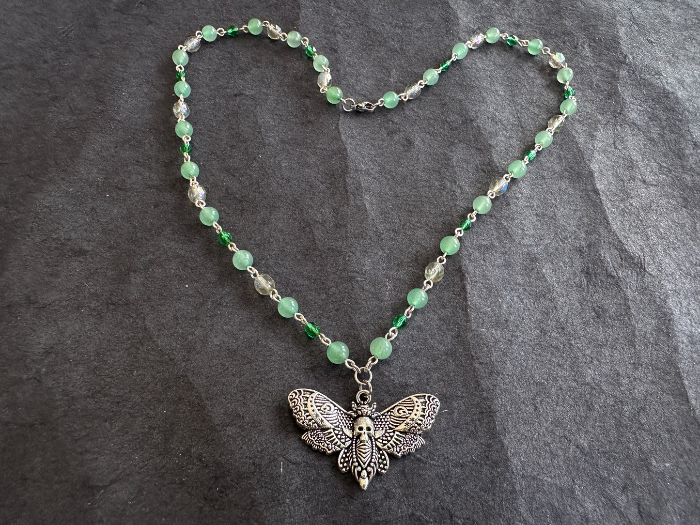 Green glass moth necklace