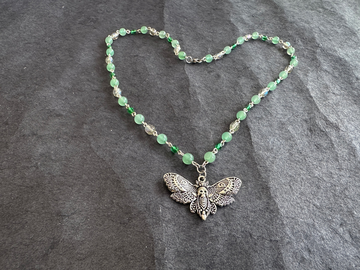 Green glass moth necklace