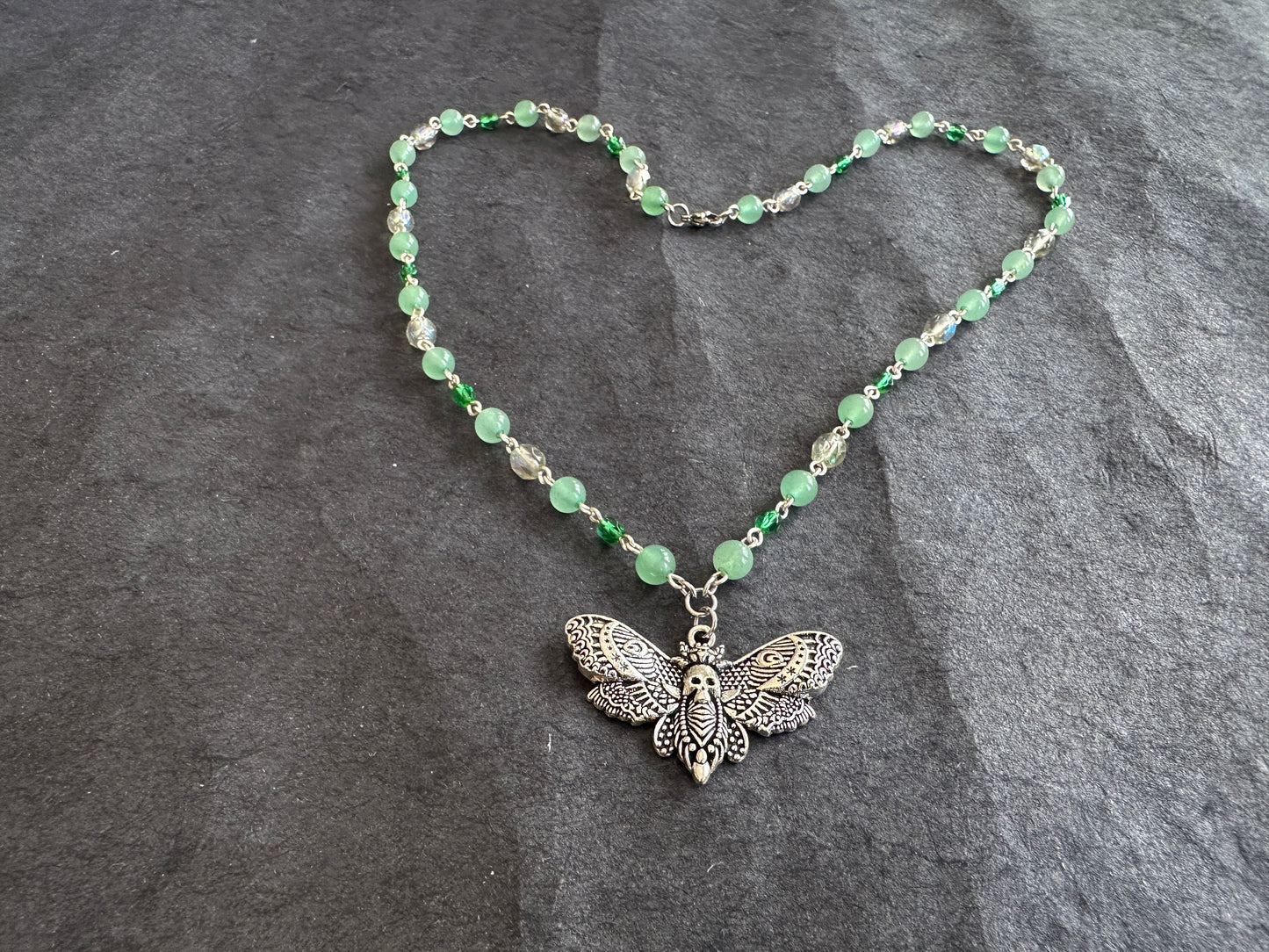 Green glass moth necklace