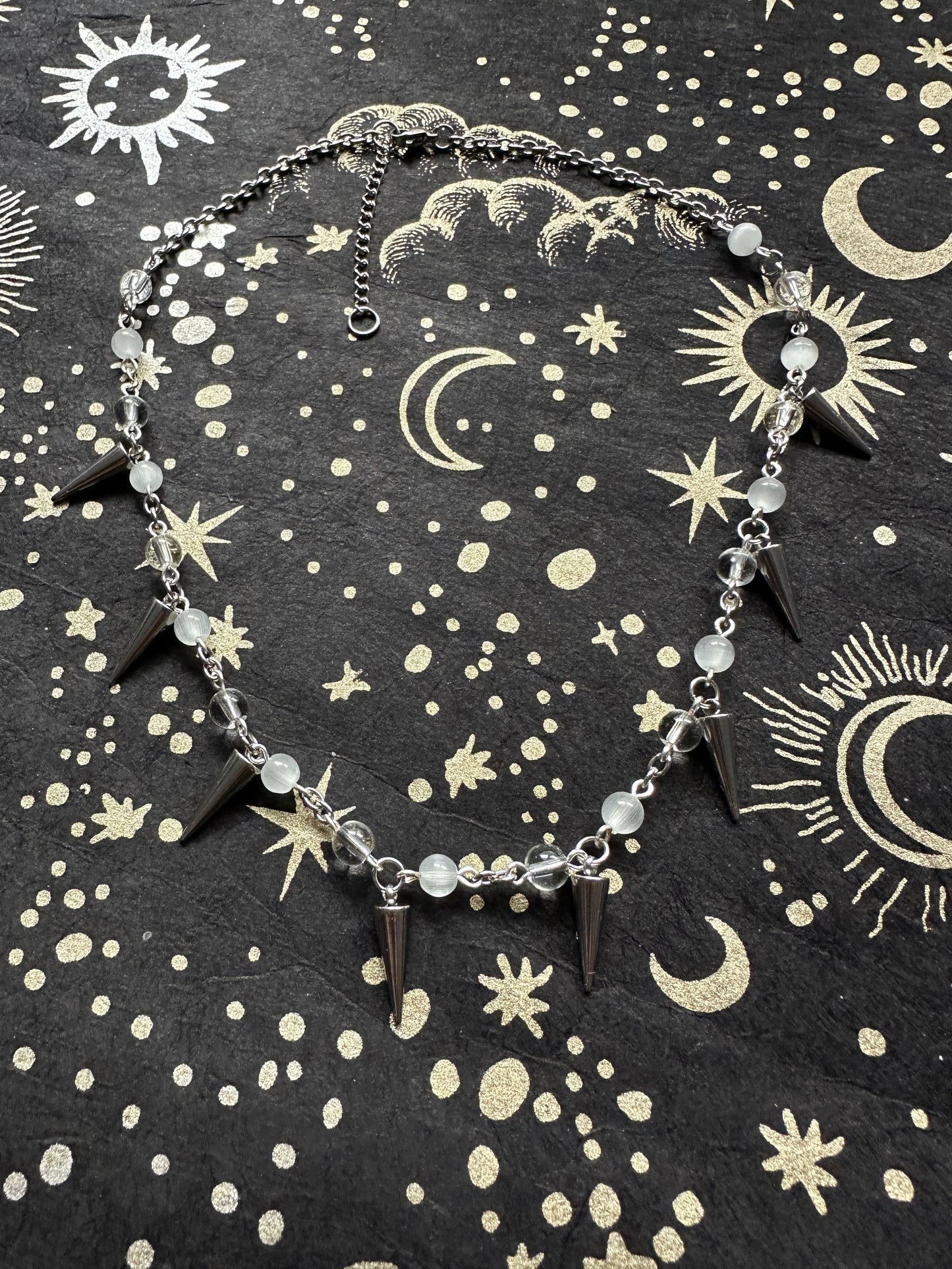 Stainless steel spike choker with glass and cats eye beads