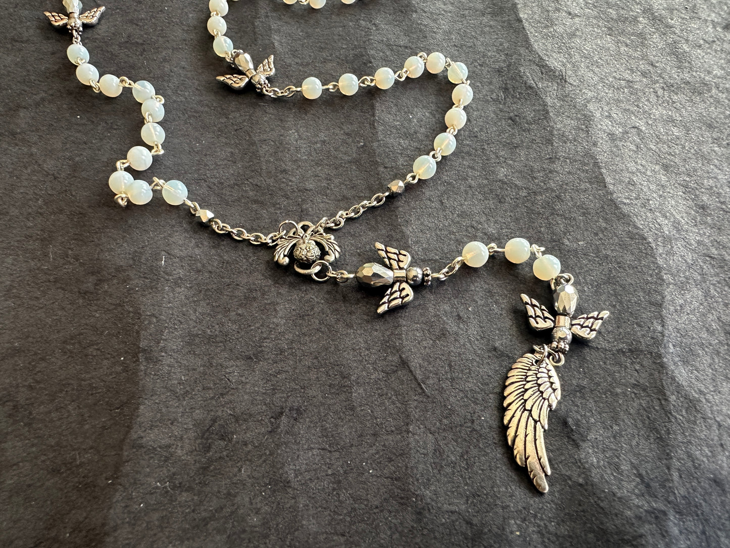 The fall of angels antique beads rosary