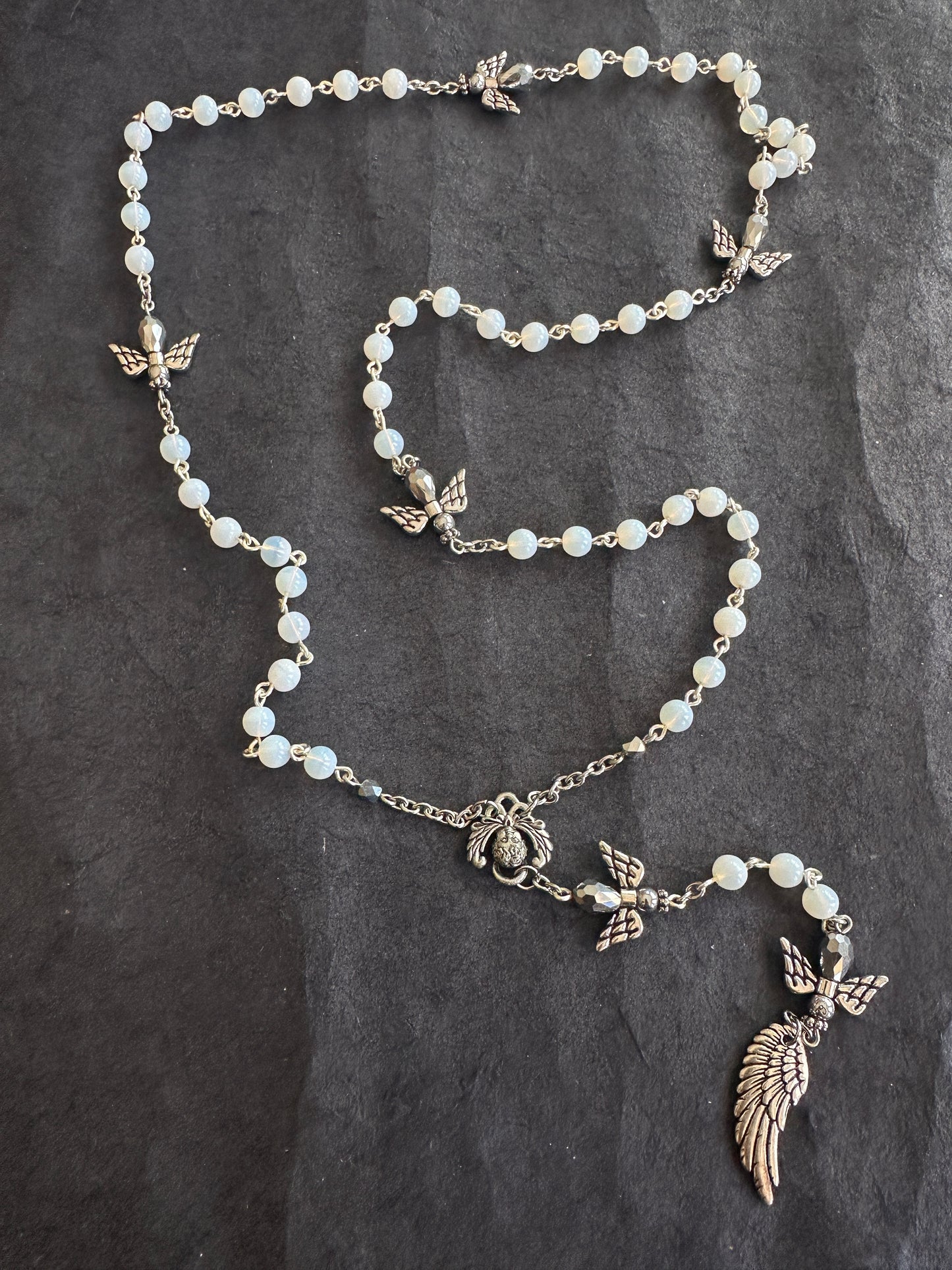 The fall of angels antique beads rosary