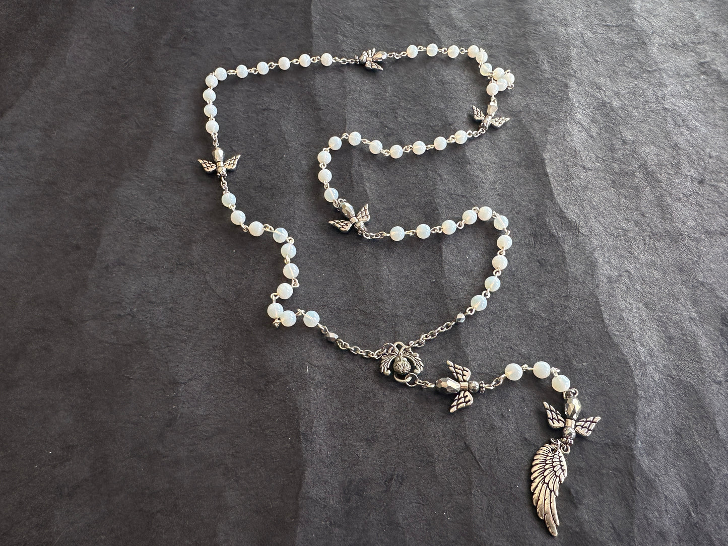 The fall of angels antique beads rosary