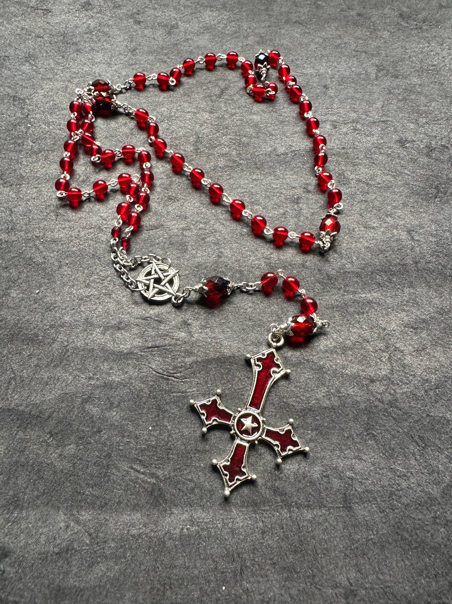 Red glass cross unholy rosary