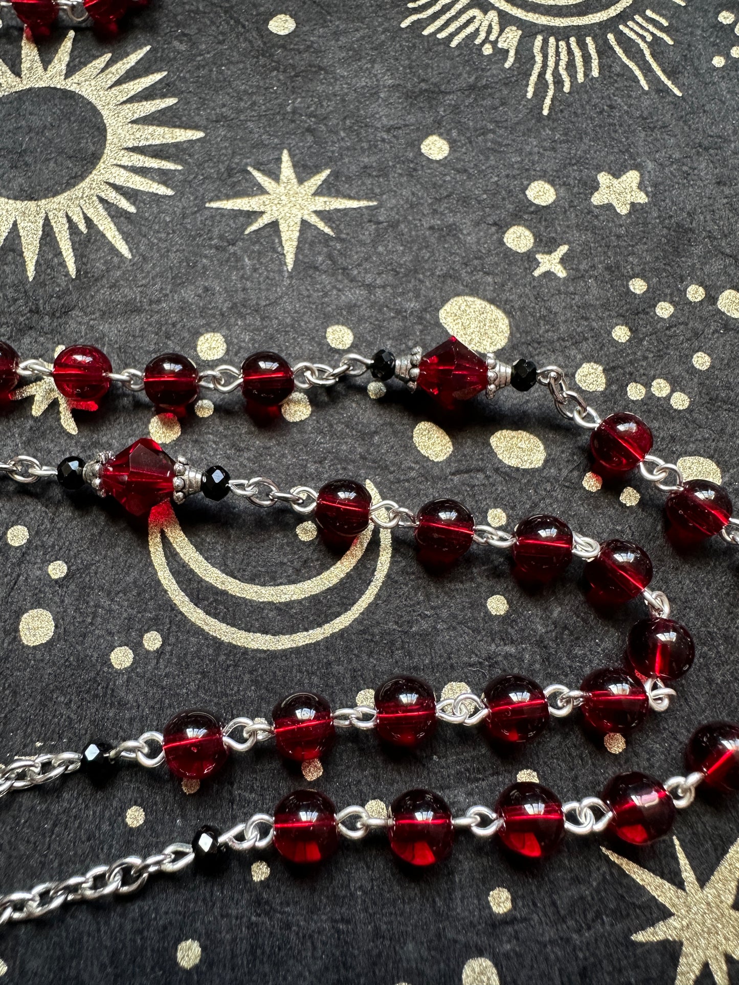Red glass Unholy Rosary