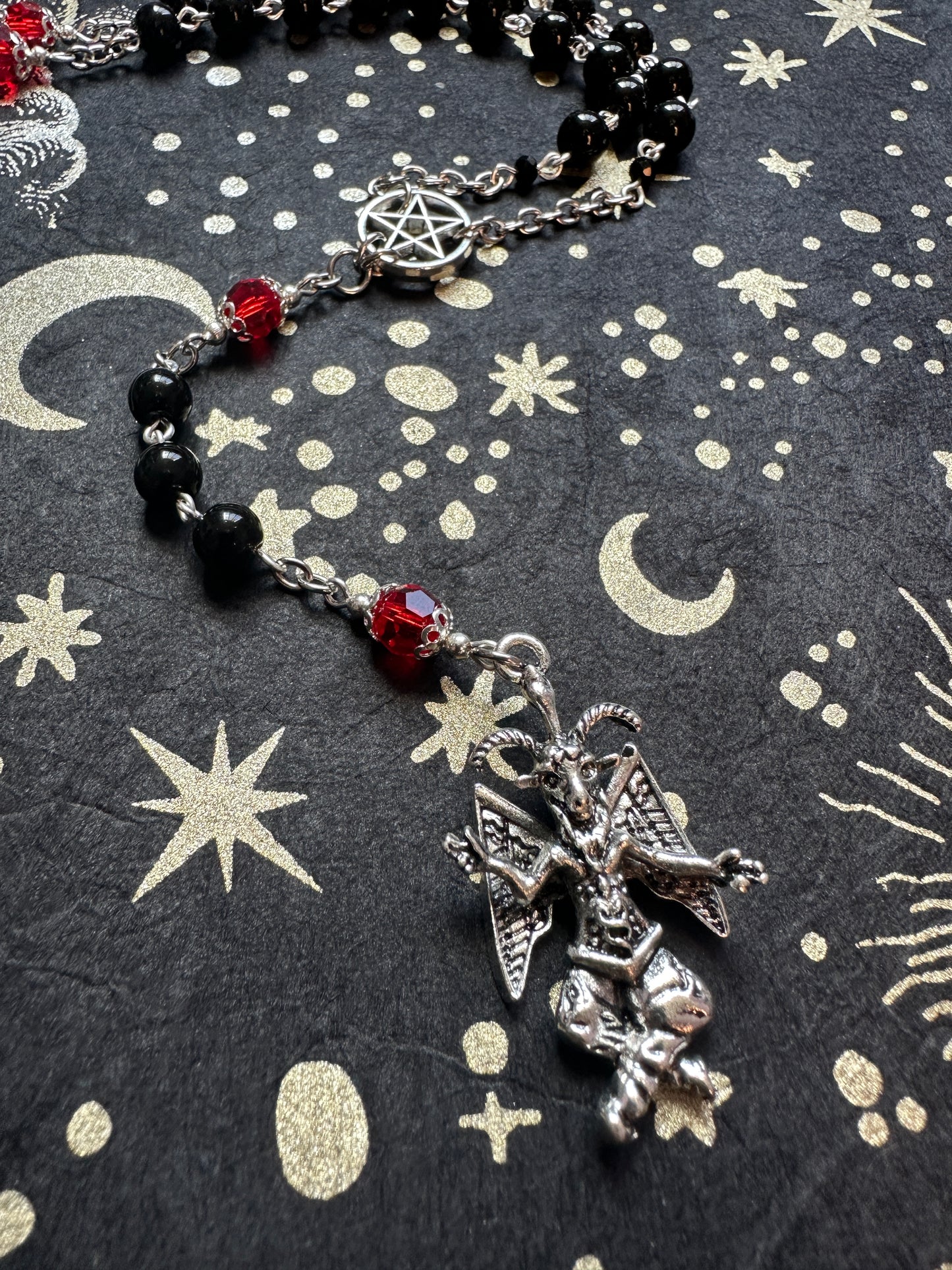 Baphomet rosary with red crystals