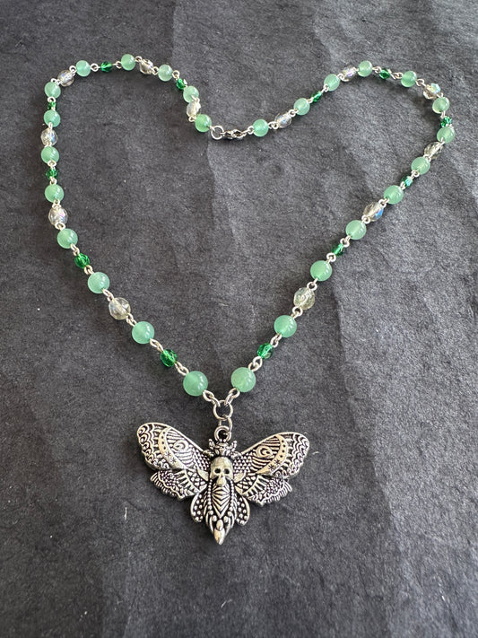 Green glass moth necklace