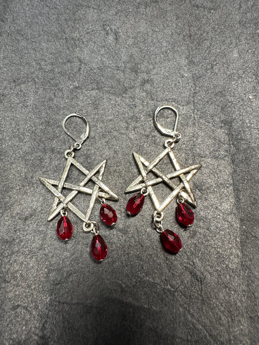Hexagram earrings with red drop beads