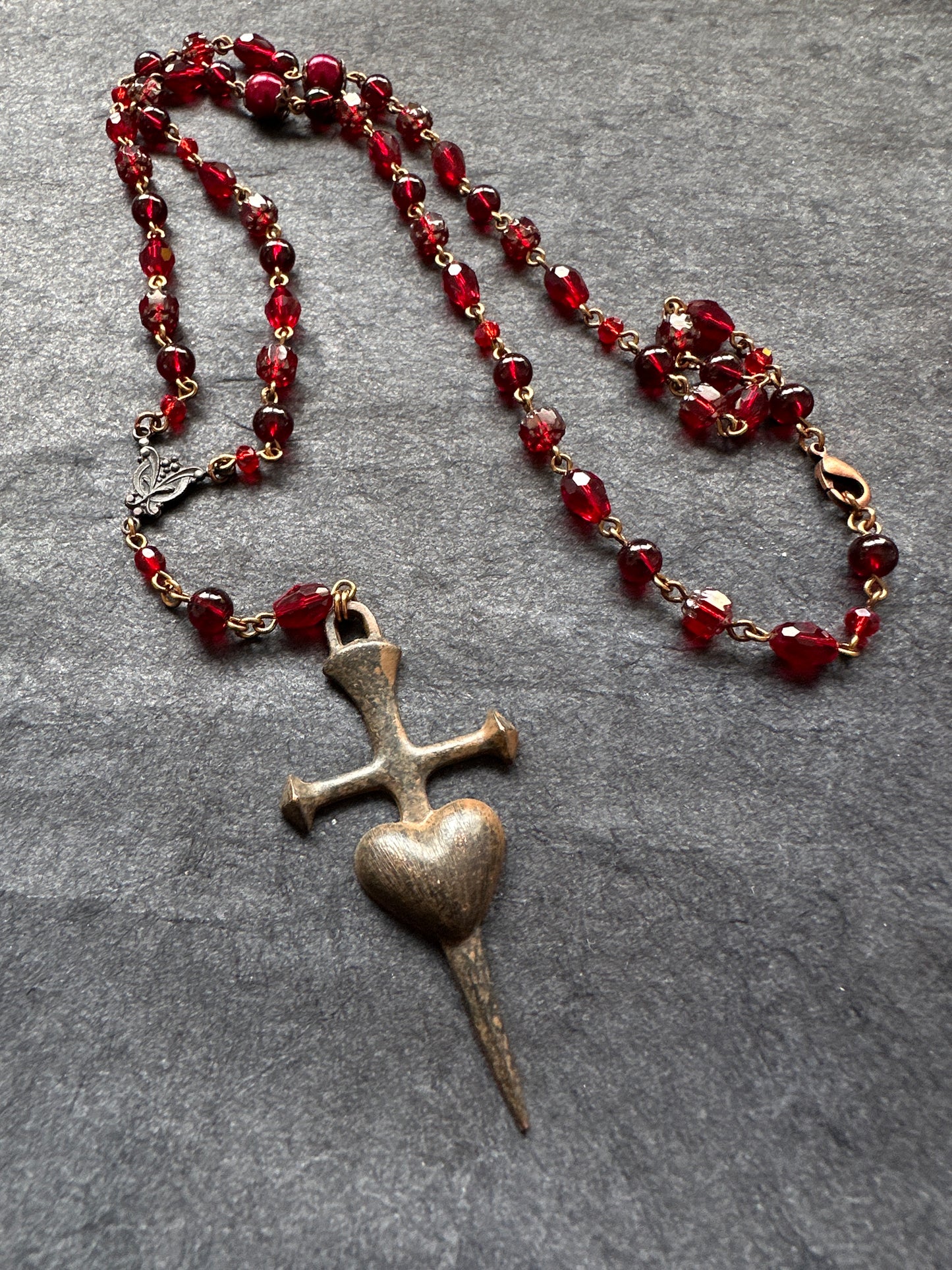 Pierced heart red glass necklace